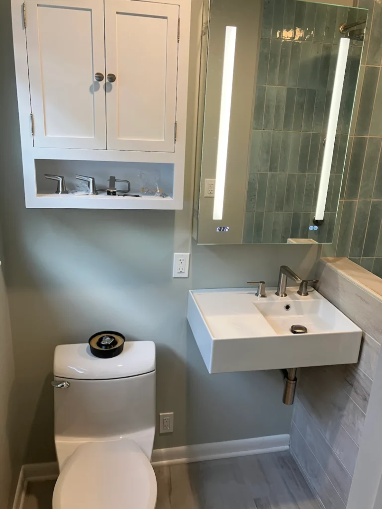 Well lit bathroom with sink
