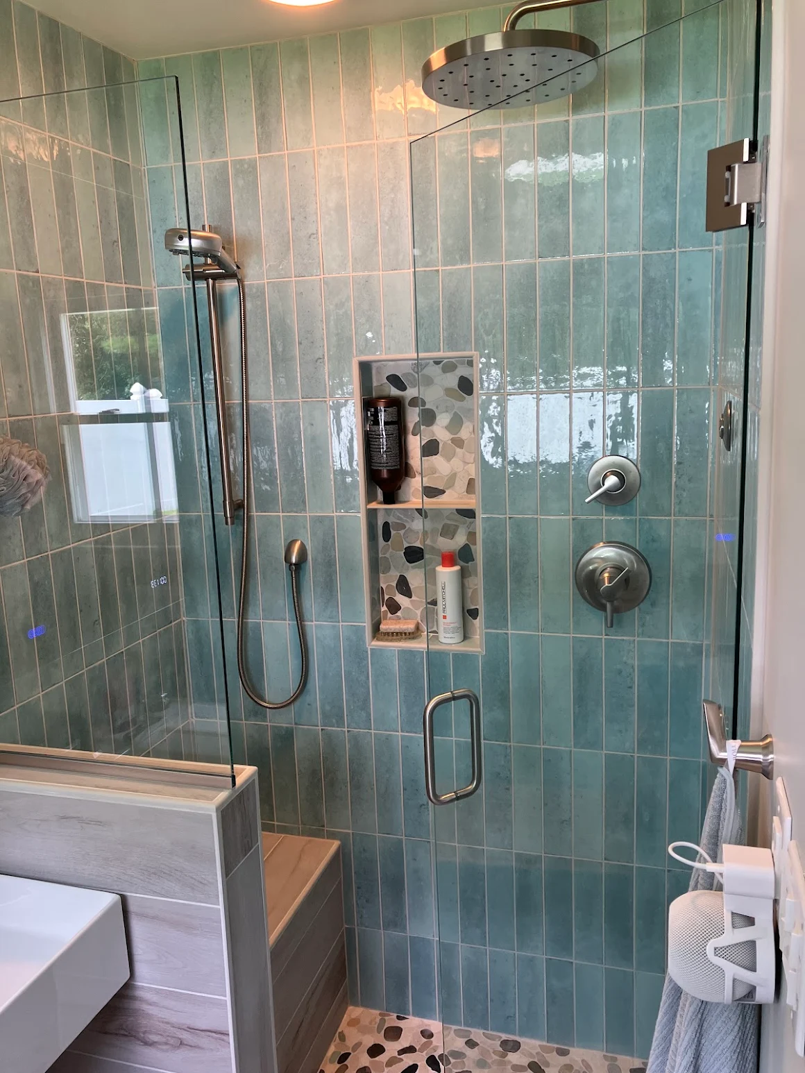 Green tile shower with glass