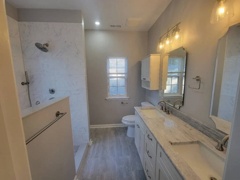 Large custom bathroom dual vanity and open shower