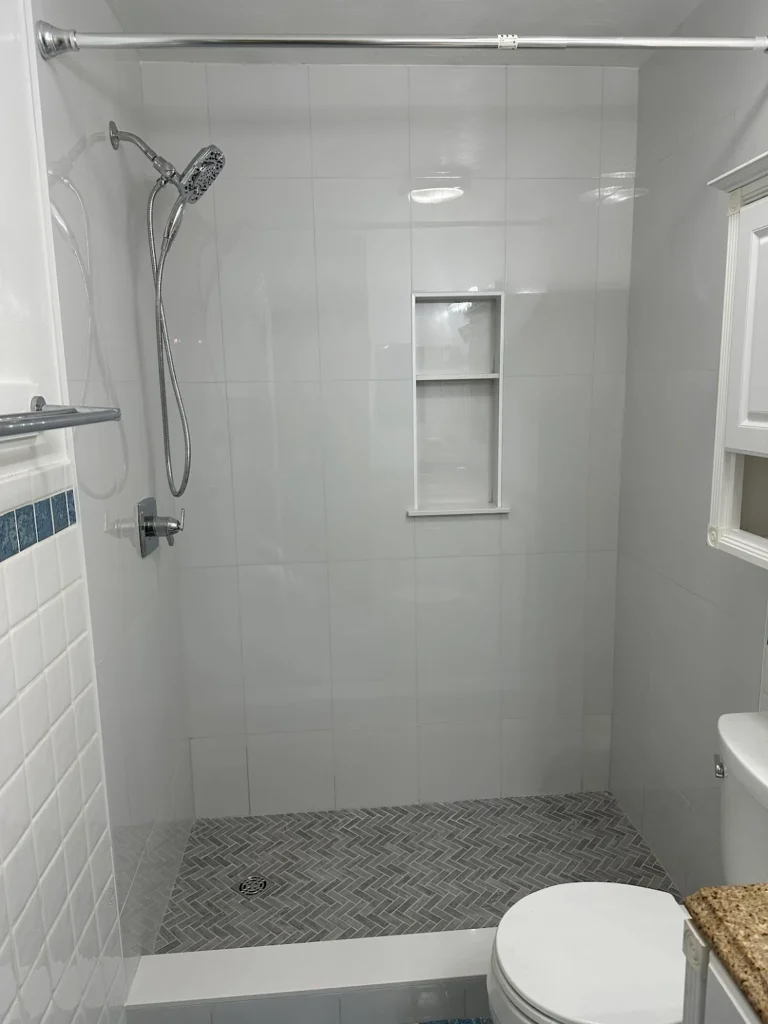 Walk in shower grey tile